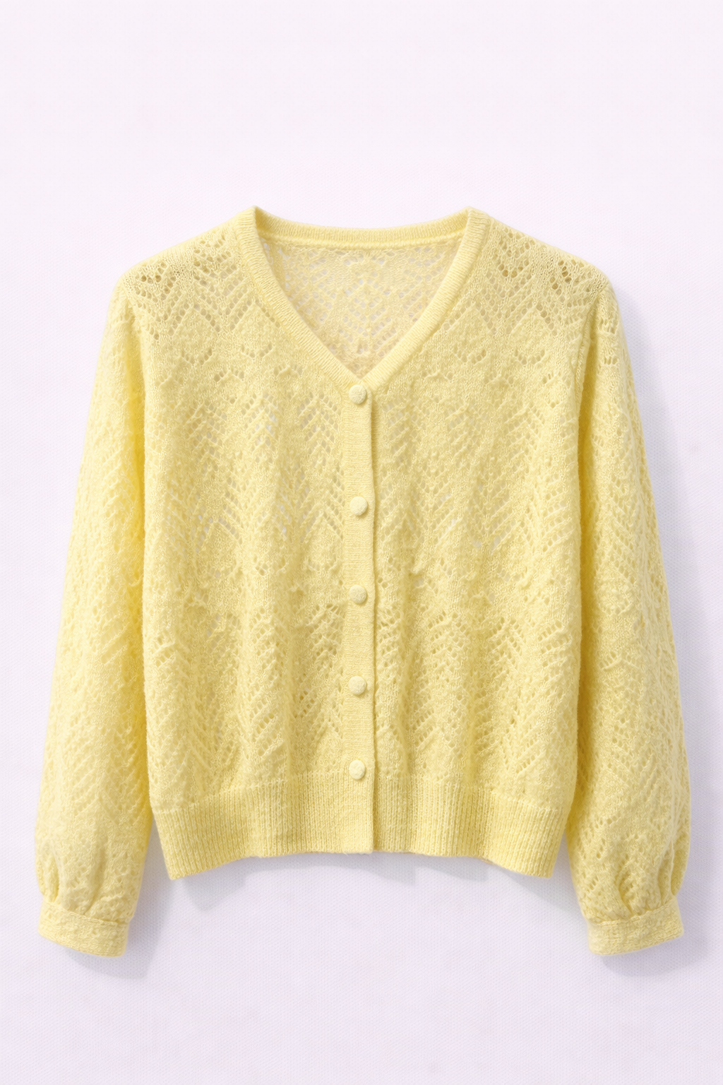 Gilet ajouré jaune pastel