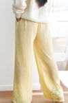 Pantalon large jaune pastel à rayures