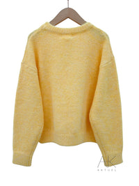 Pull oversize doux jaune pastel