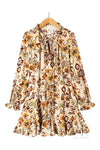 Robe imprimée rouille ceinturée à manches longues